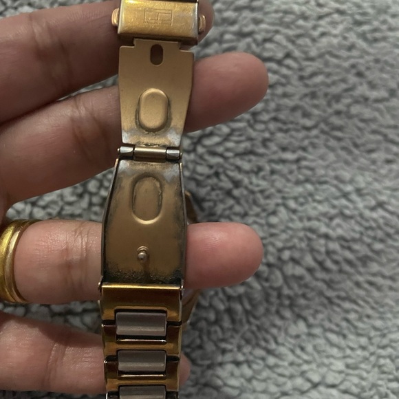 Tommy Hilfiger. Big round watch with glitter stones around it. - Picture 5 of 6